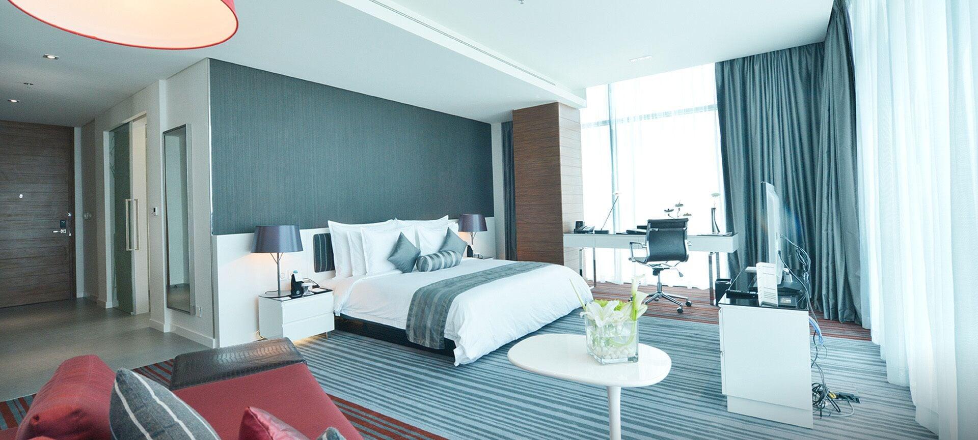 ラミー グランド ホテル アンド スパ マナーマ エクステリア 写真 A bedroom in a hotel
