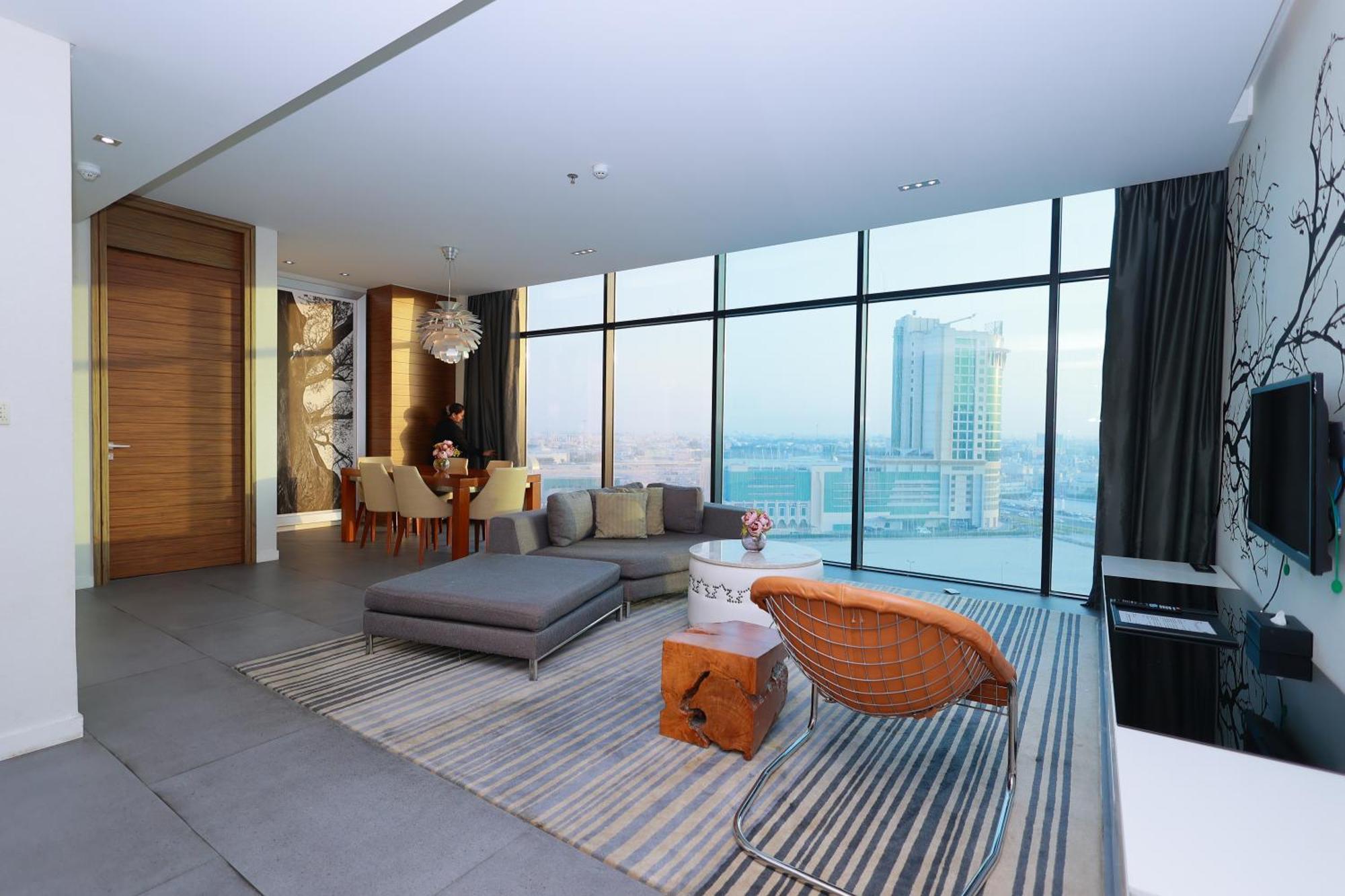 ラミー グランド ホテル アンド スパ マナーマ エクステリア 写真 Interior of a typical apartment